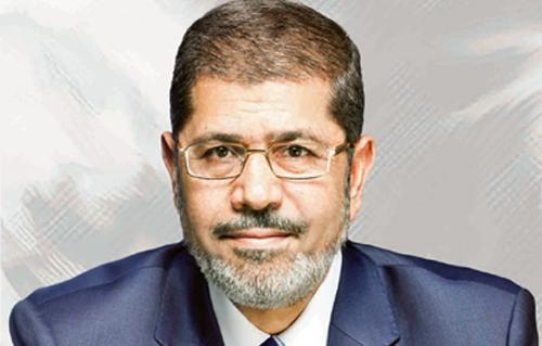 الرئيس مرسي يشهد بعد غد الاحتفال بعيد العلم ويكرم  عالما مصريًا