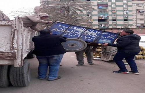 بالصور حملة لإزالة الإشغالات بشارعي الهرم واللبيني بفيصل 