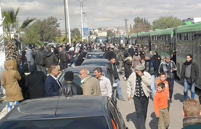 سكان أحياء جنوب دمشق يرفضون اتفاق إيران والمعارضة  بالخروج من بلداتهم