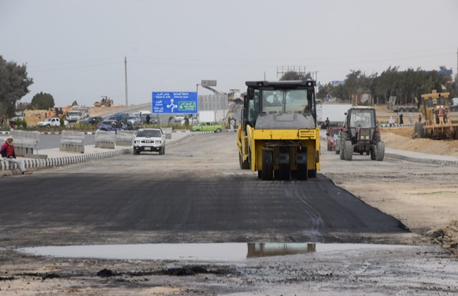  أعمال الرصف والتطوير بمحور عدلي منصور