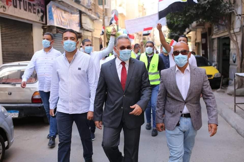 مرشحا القائمة الوطنية يقودان مسيرة شبابية بالإسكندرية لحث المواطنين على المشاركة بالانتخابات | صور 