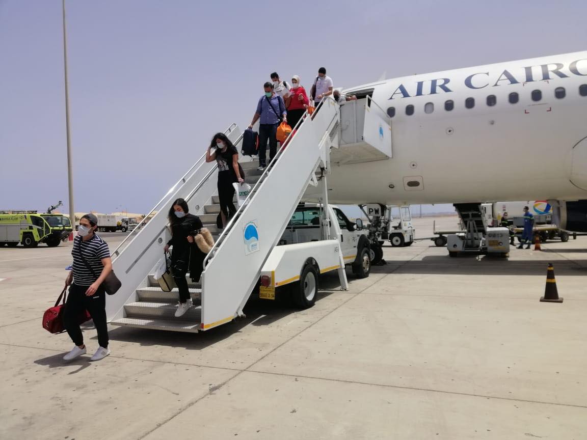 وصول رحلة المصريين العالقين في إندونسيا وعمان إلى مطار مرسى علم 