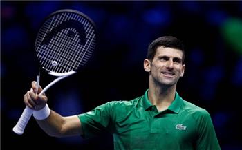         Djokovic s'est qualifié pour le quatrième tour du tournoi de tennis de l'Open d'Australie aux dépens de Dimitrov