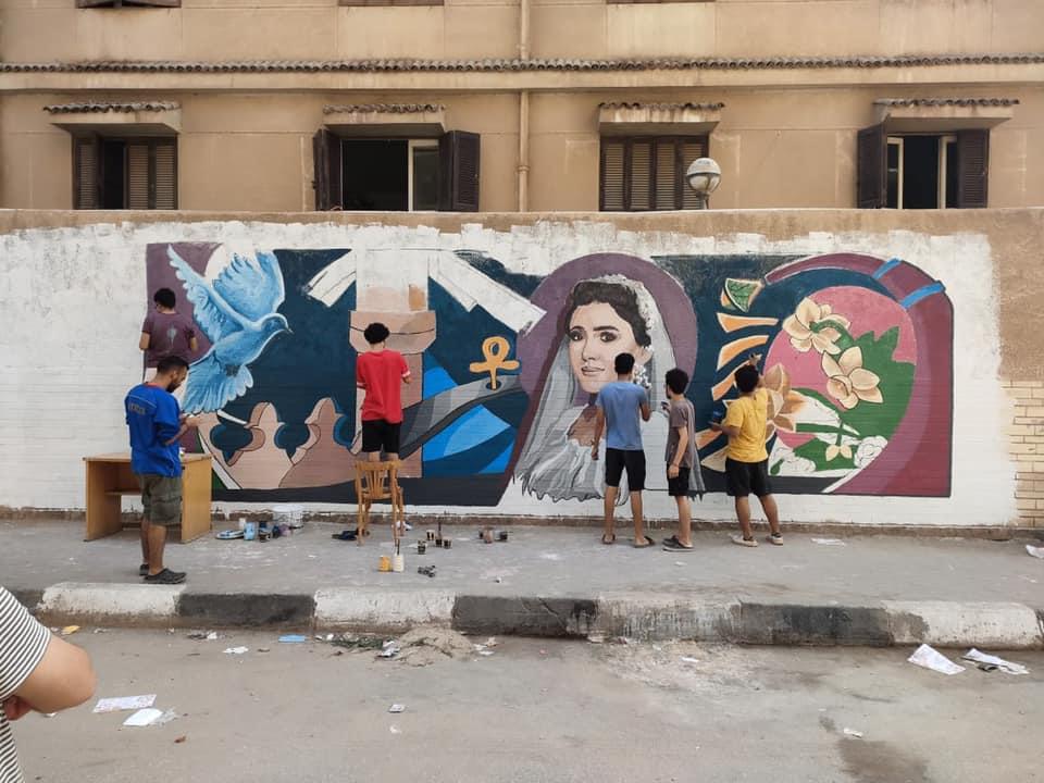 طلاب فنون جميلة المنصورة يرسمون جرافيتي لـ;نيرة أشرف; على سور الجامعة |صور 