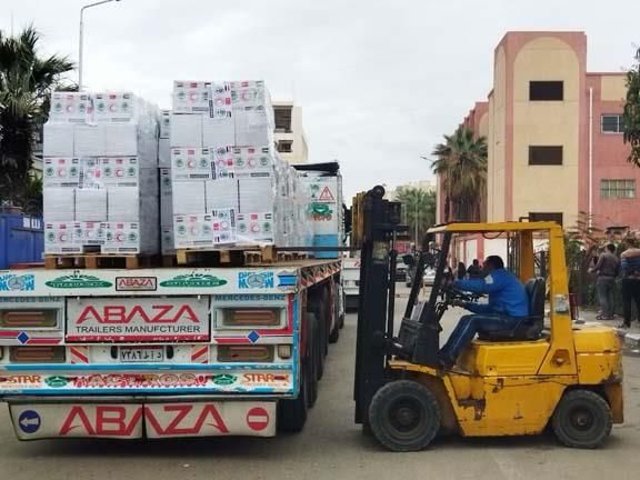  الهلال الأحمر ببورسعيد وجمعية عثمان أوغلو التركية يرسلان 9 شاحنات مساعدات لغزة|صور