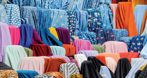 التربيعة» .. حلم البنات فى سوق القماش - الأهرام اليومي